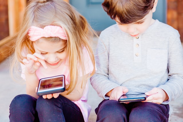 kids having fun on phones