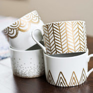 white DIY mugs designed with gold geometric shapes