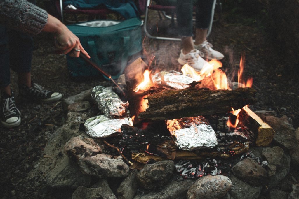 foil dinner cooking in the fire